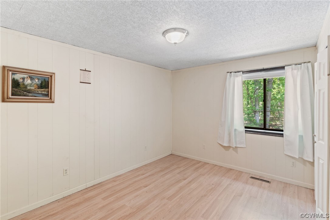 7192 South James River Road Buckingham, VA 23921 - Photo 18 of 29 an empty room with a window