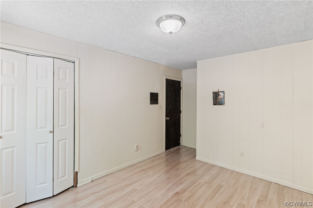 7192 South James River Road Buckingham, VA 23921 - Photo 19 of 29 a view of an empty room with wooden floor
