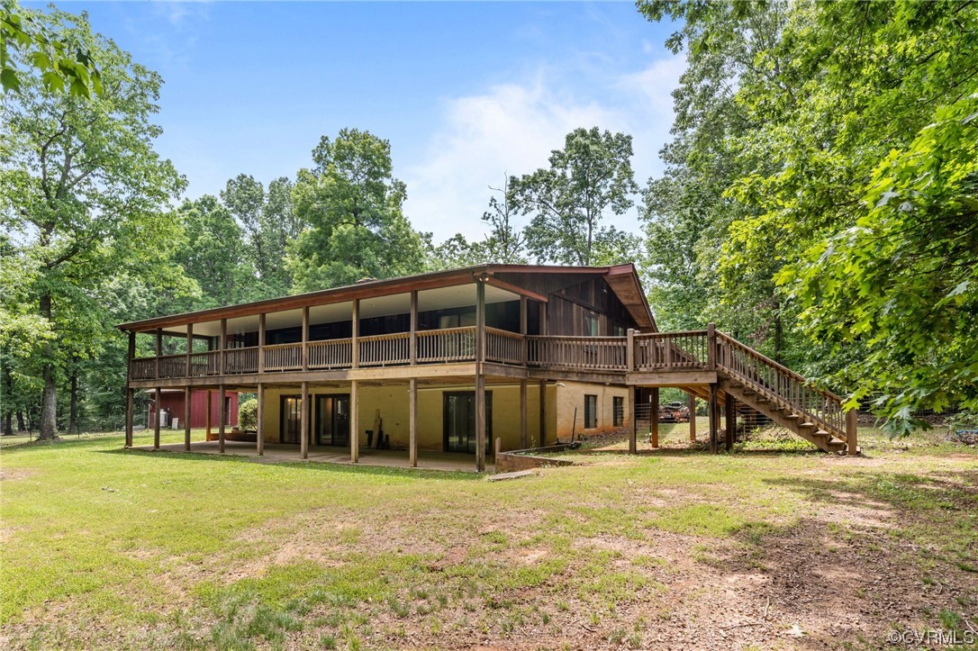 7192 South James River Road Buckingham, VA 23921 - Photo 24 of 29 a front view of a house with a garden