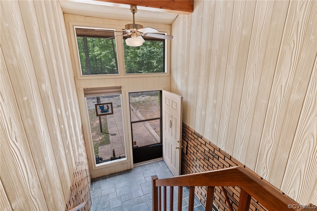 7192 South James River Road Buckingham, VA 23921 - Photo 8 of 29 a view of a hallway with wooden floor and staircase