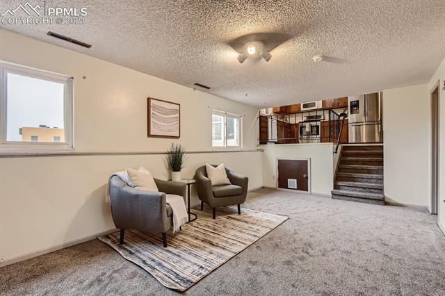 5820 Garmish Road Colorado Springs, CO 80918 - Photo 11 of 23 View from lower level towards the kitchen