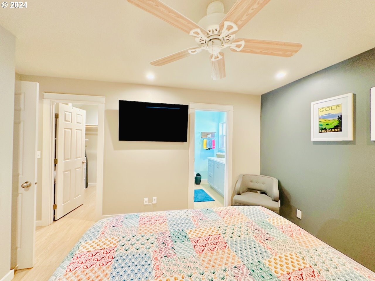 6470 Main Street Springfield, OR 97478 - Photo 15 of 35 a bedroom with a bed and a flat screen tv