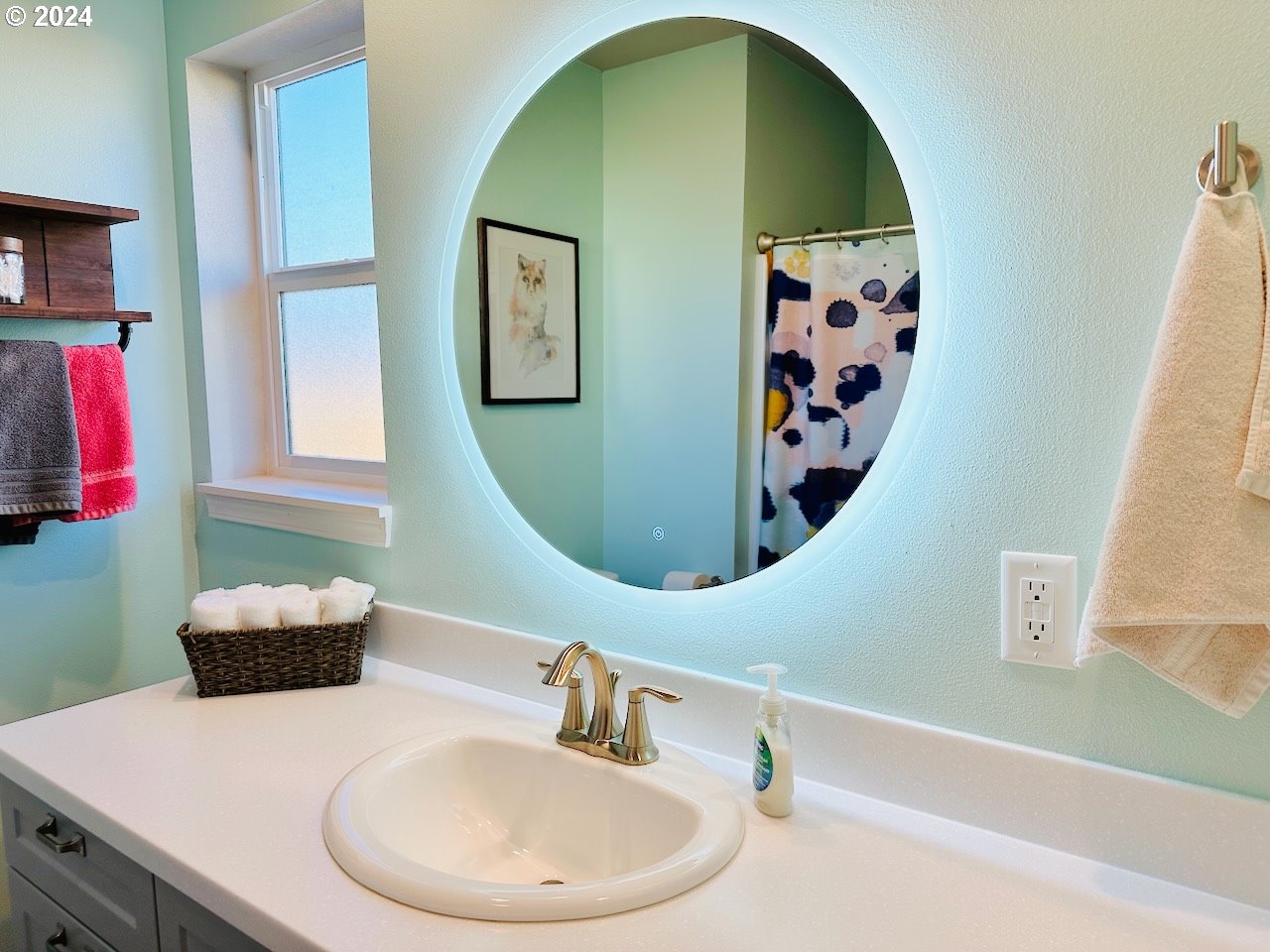 6470 Main Street Springfield, OR 97478 - Photo 16 of 35 a bathroom with a sink and a mirror