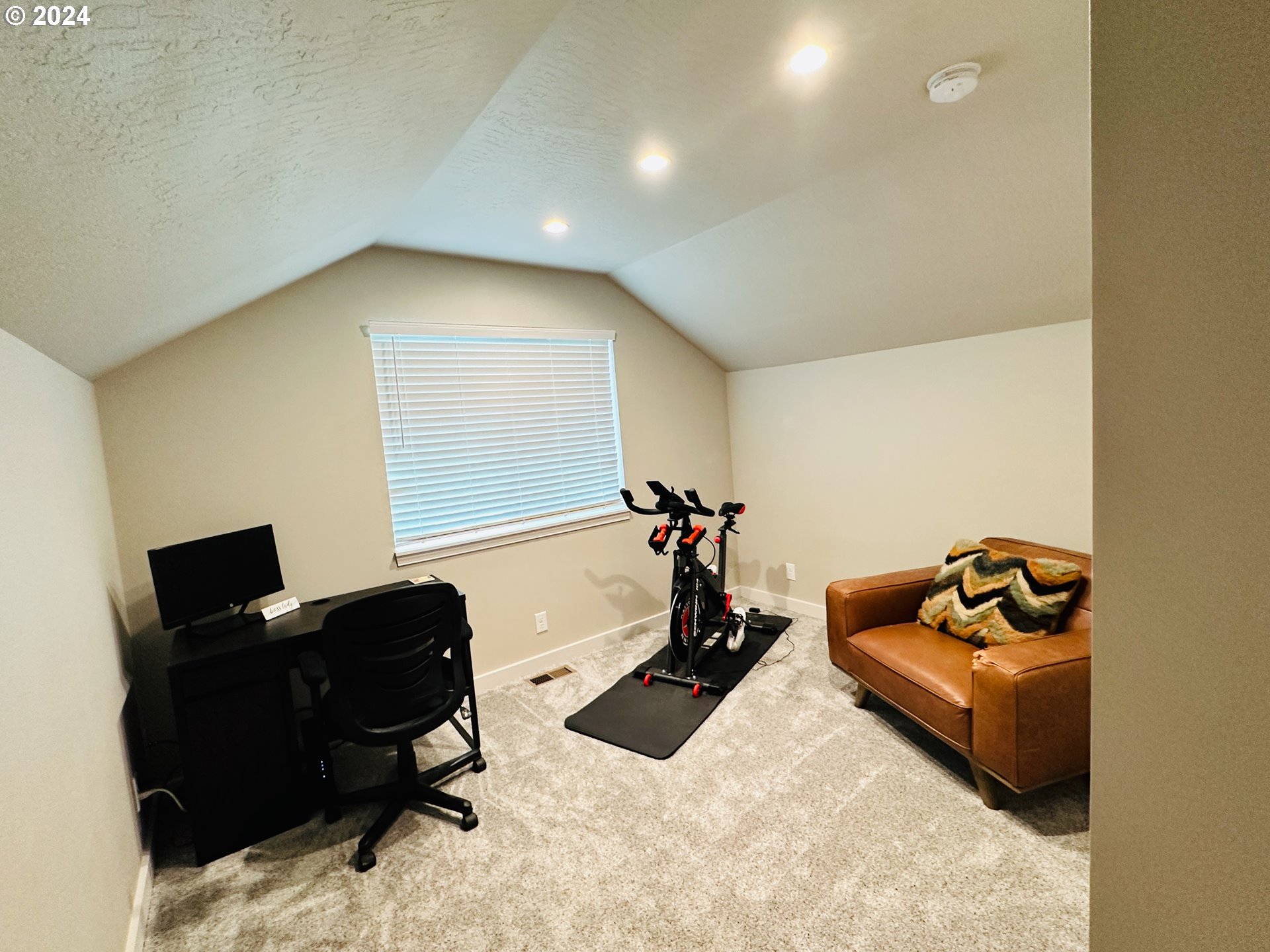 6470 Main Street Springfield, OR 97478 - Photo 20 of 35 a bedroom with a bed and a couch