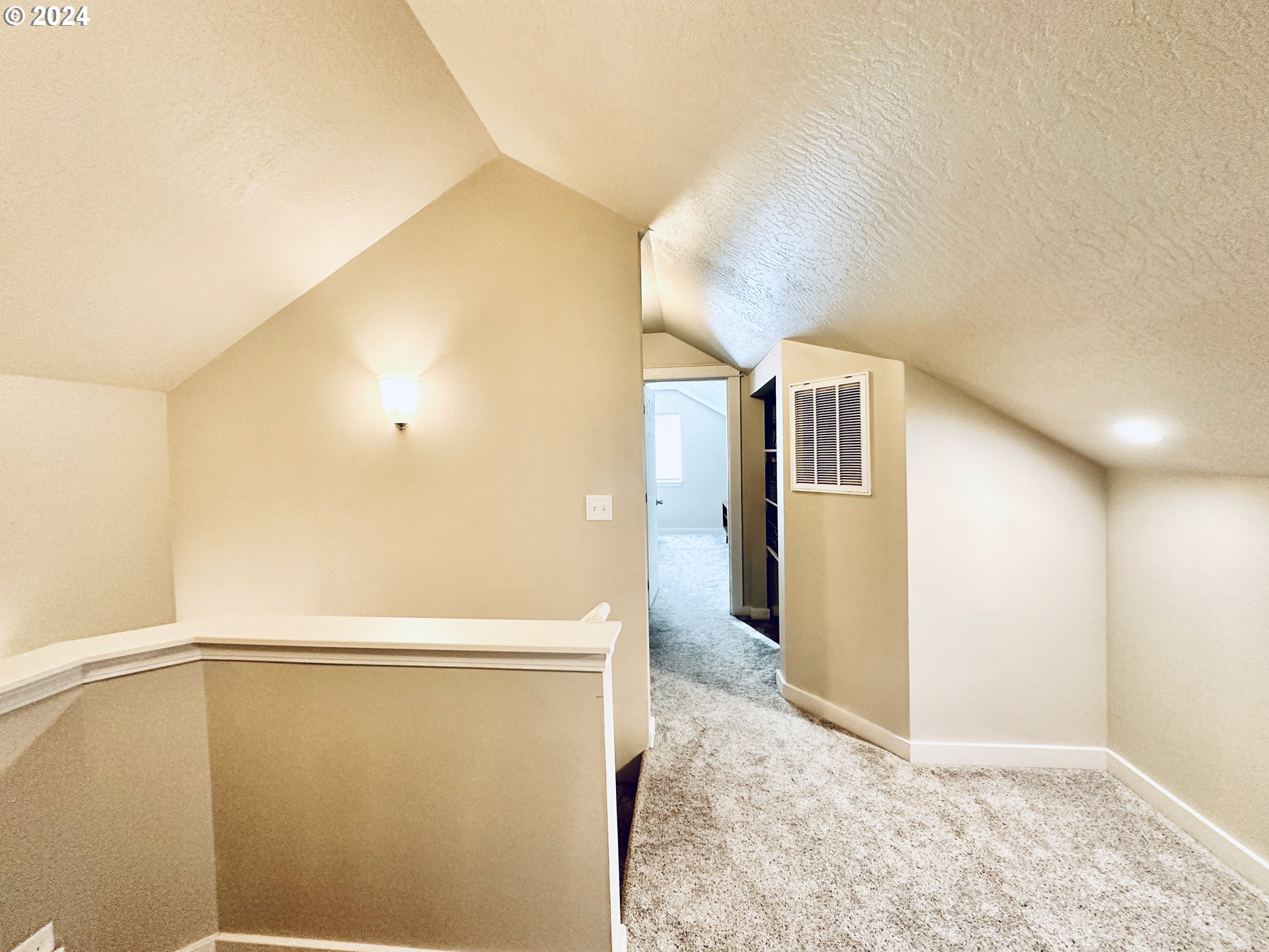 6470 Main Street Springfield, OR 97478 - Photo 21 of 35 a view of a big room with closet and wooden floor
