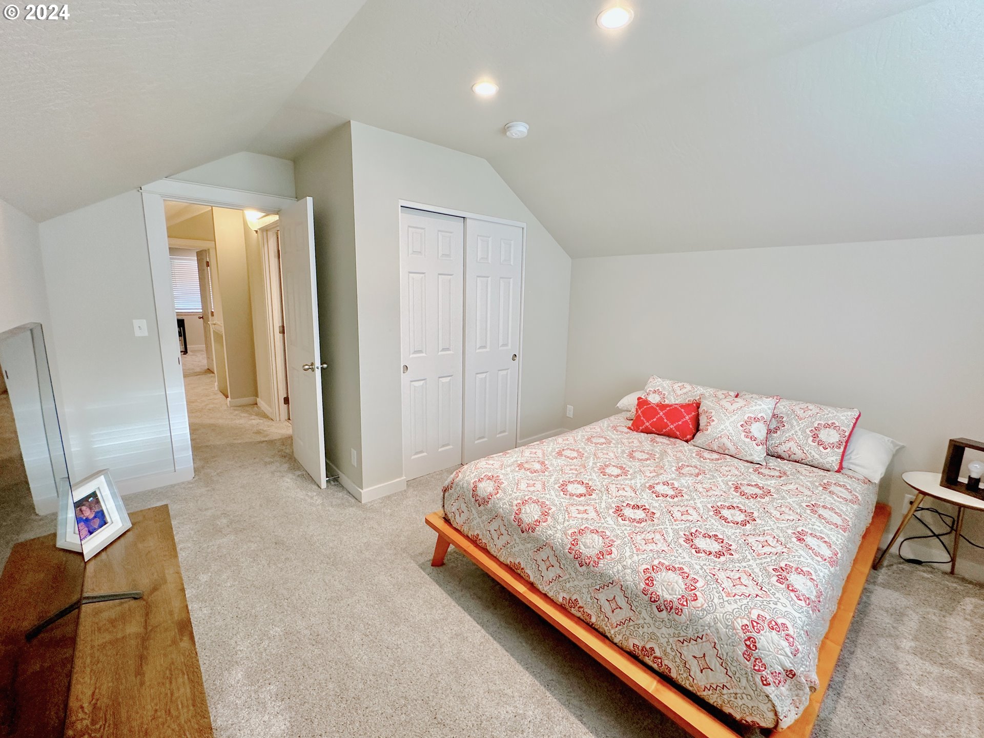 6470 Main Street Springfield, OR 97478 - Photo 26 of 35 a bedroom with a bed and a painting on the wall