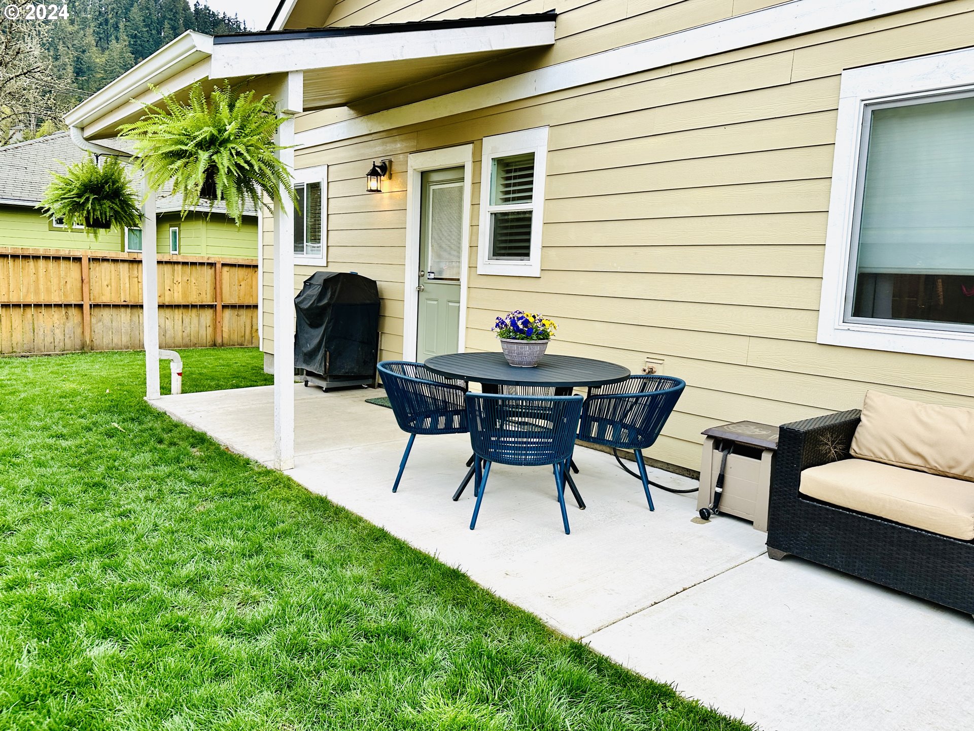 6470 Main Street Springfield, OR 97478 - Photo 32 of 35 a view of a backyard with a patio and a patio