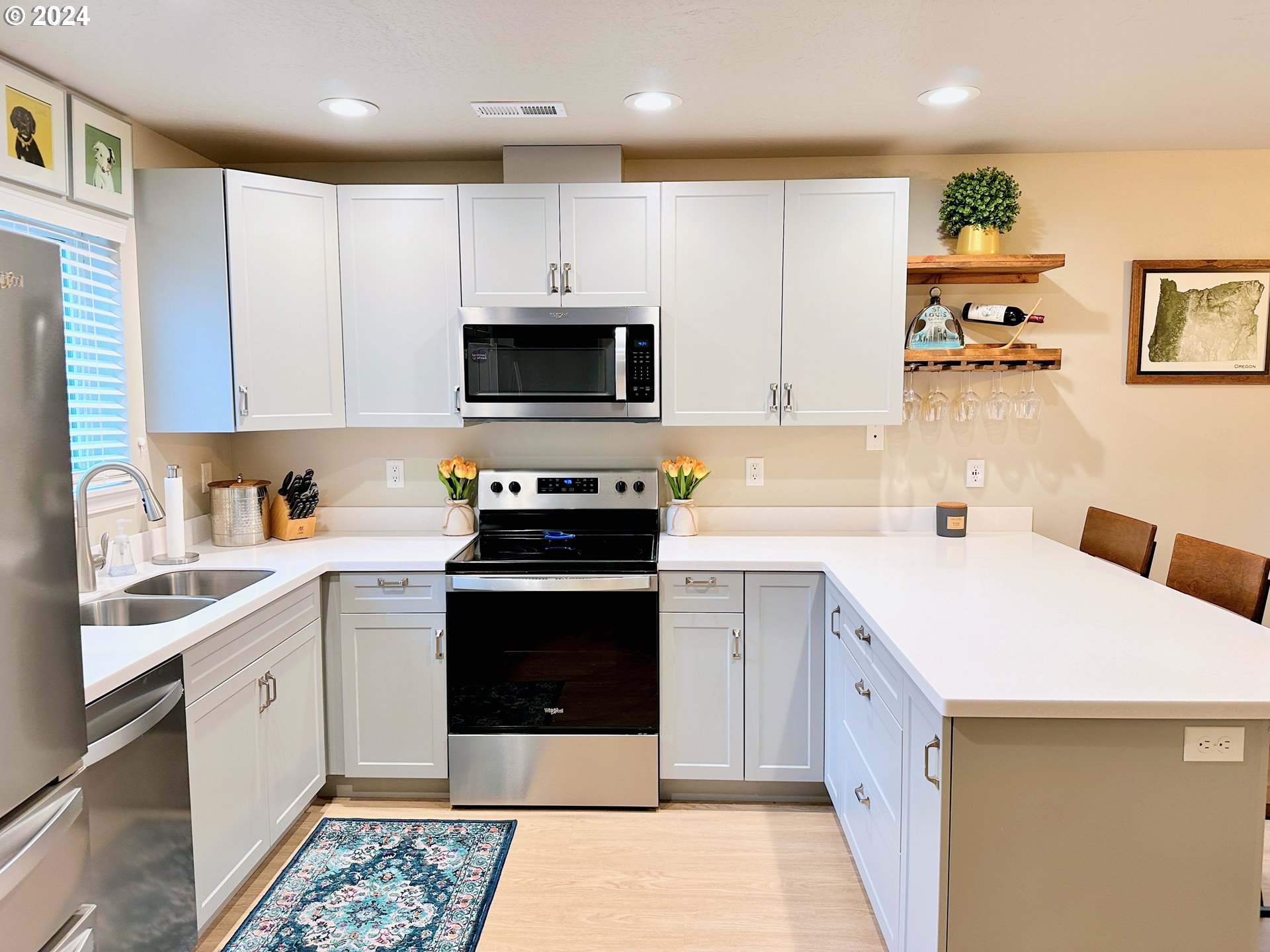 6470 Main Street Springfield, OR 97478 - Photo 9 of 35 a kitchen with a sink a stove and cabinets