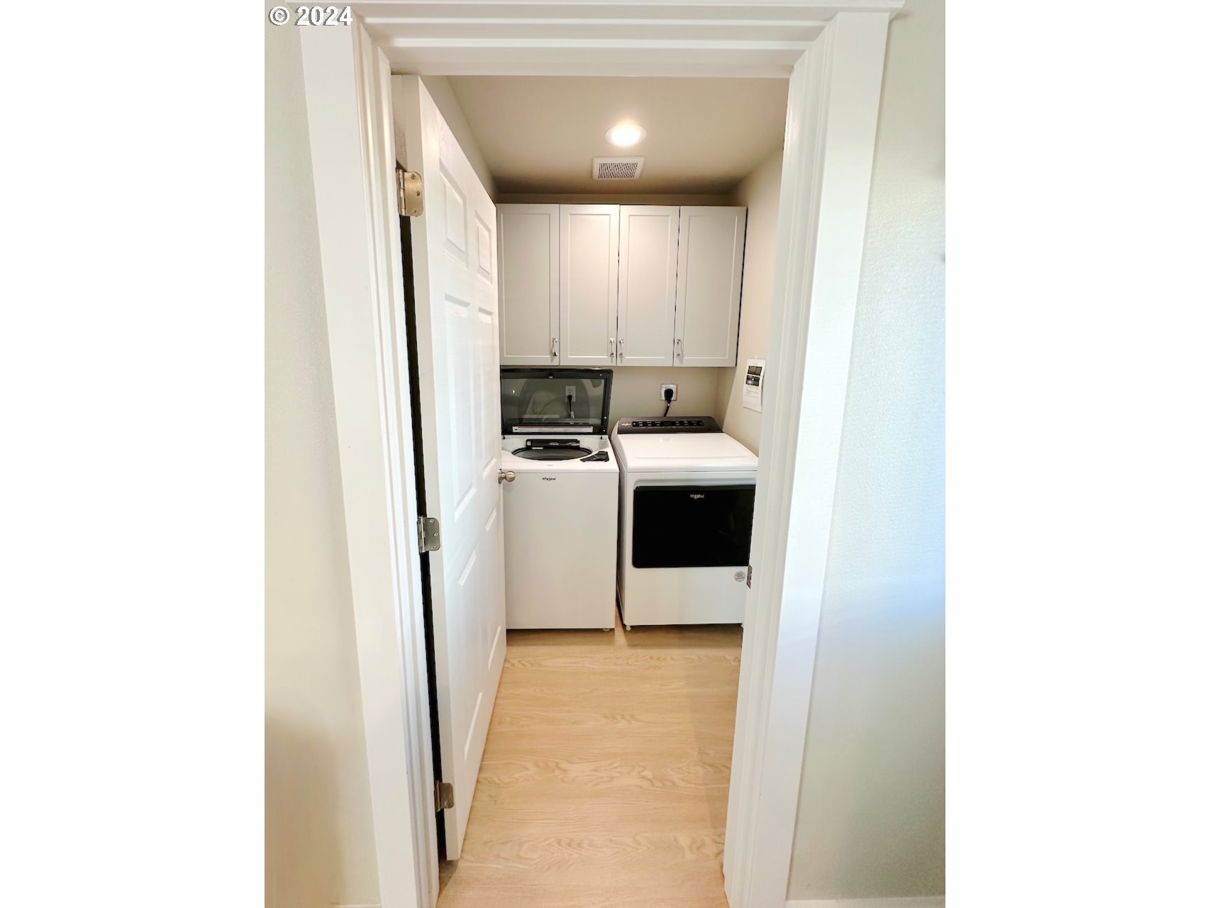 6470 Main Street Springfield, OR 97478 - Photo 10 of 35 a view of a hallway with washer and dryer