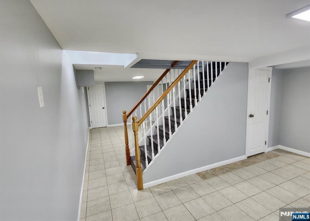 111 Church Street Lodi, NJ 07644 - Photo 18 of 21 a view of an entryway with wooden floor