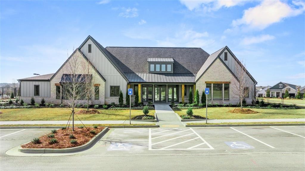 636 Parnassus Road Locust Grove, GA 30248 - Photo 2 of 44 a front view of a house with swimming pool