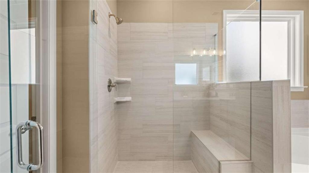 636 Parnassus Road Locust Grove, GA 30248 - Photo 28 of 44 a bathroom with a shower
