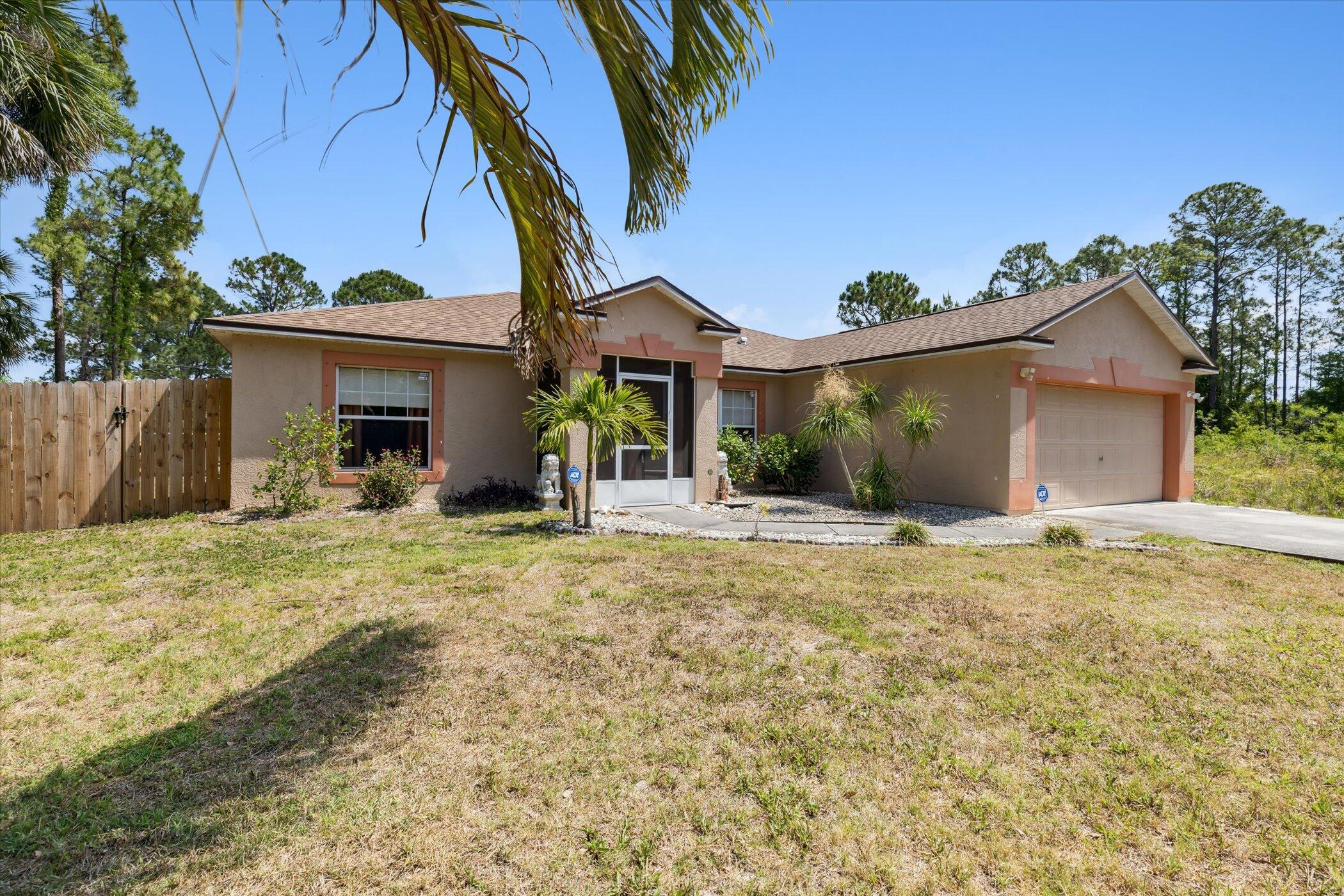 1309 Seabold Road Southwest Palm Bay, FL 32908 - Photo 1 of 40 Front of Home