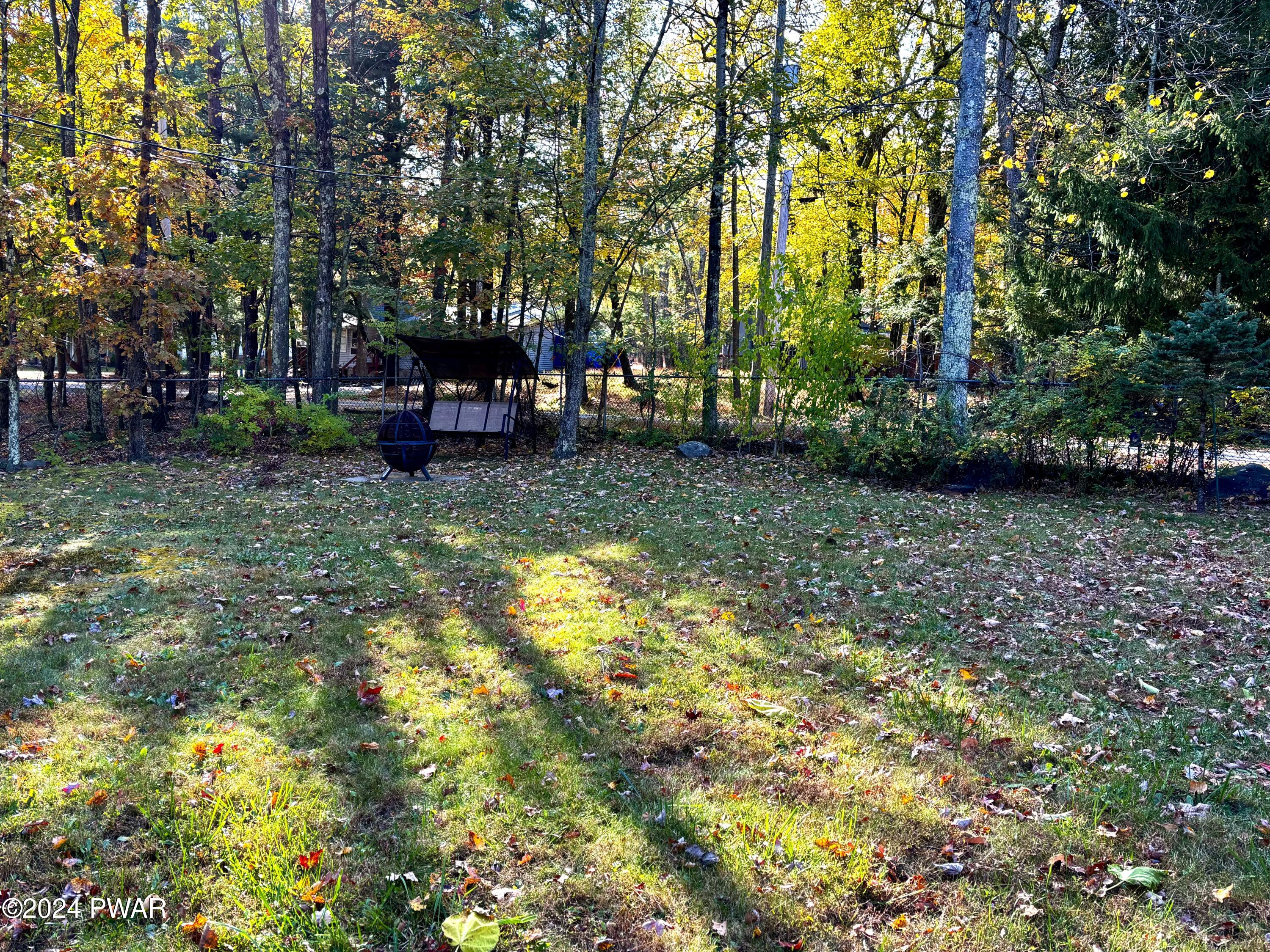 136 Stamford Road Dingmans Ferry, PA 18328 - Photo 47 of 52 a view of a yard with plants and trees