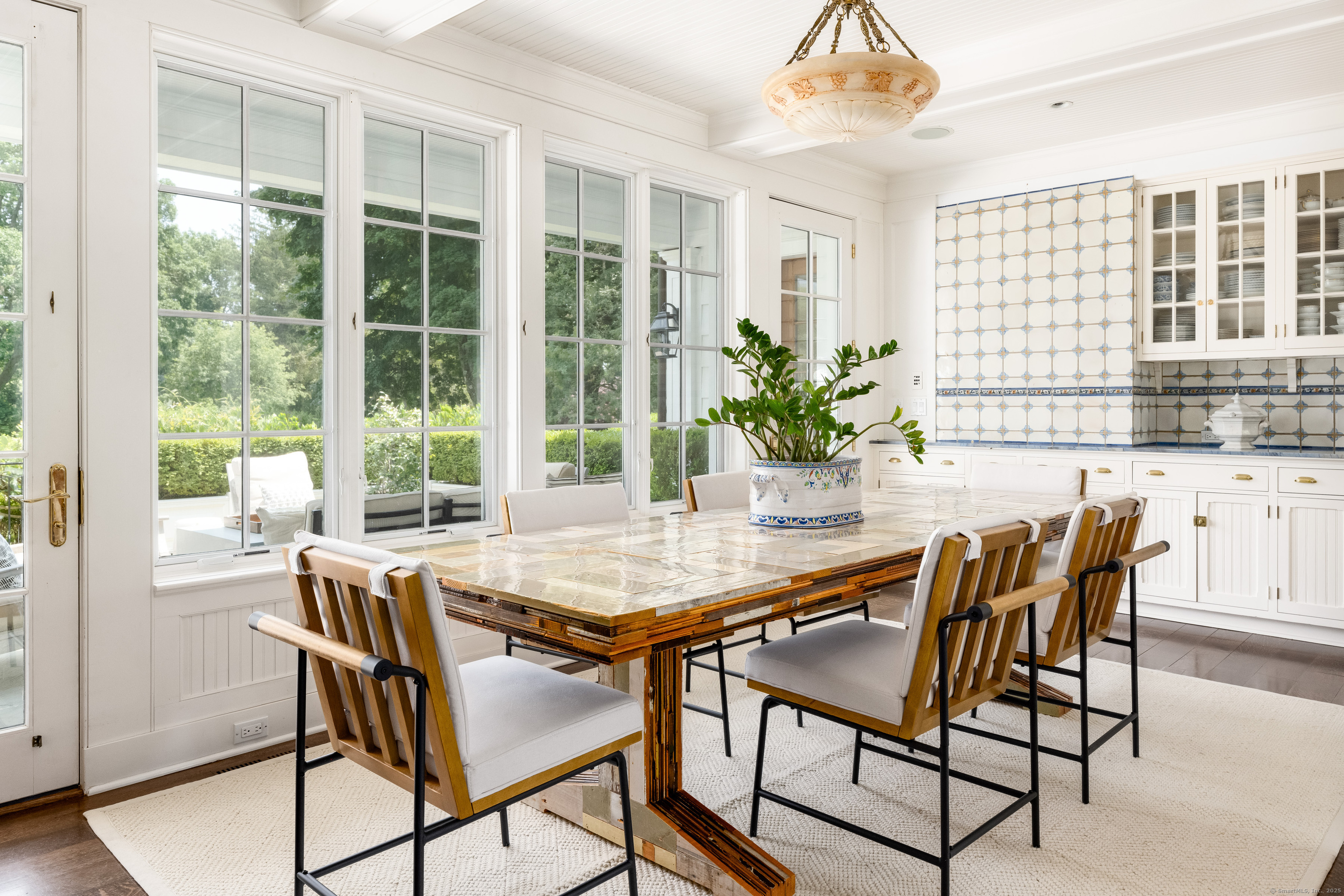 1619 Purchase Street Harrison, NY 10577 - Photo 20 of 37 a view of a dining room with furniture and window