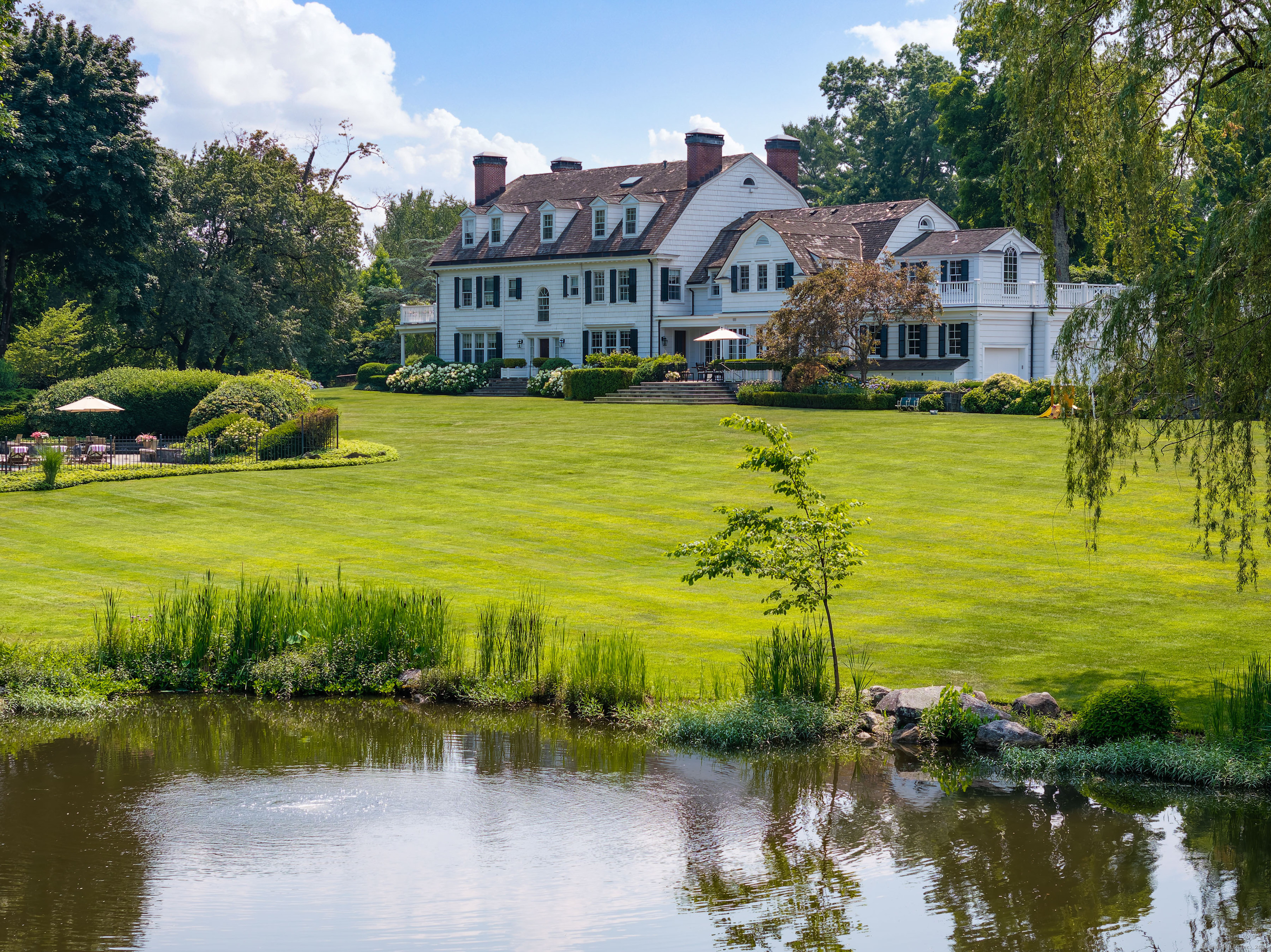 1619 Purchase Street Harrison, NY 10577 - Photo 4 of 37 a view of a lake with houses
