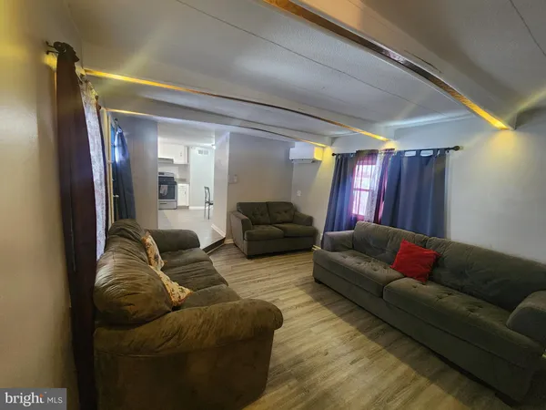 a living room with furniture and a couch