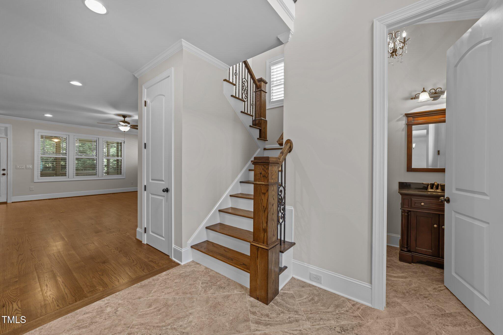 1512 Piazzo Court Apex, NC 27502 - Photo 2 of 59 a view of entryway with wooden floor and a livingroom