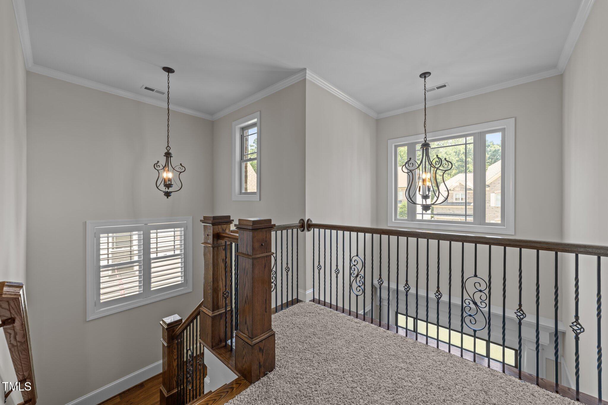 1512 Piazzo Court Apex, NC 27502 - Photo 23 of 59 a view of a room with gym equipment