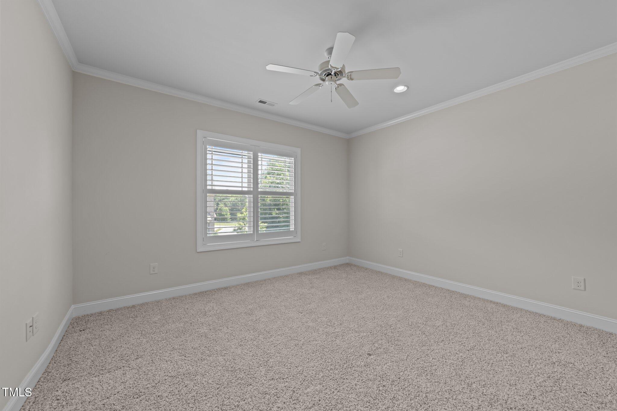 1512 Piazzo Court Apex, NC 27502 - Photo 25 of 59 a view of an empty room with a window
