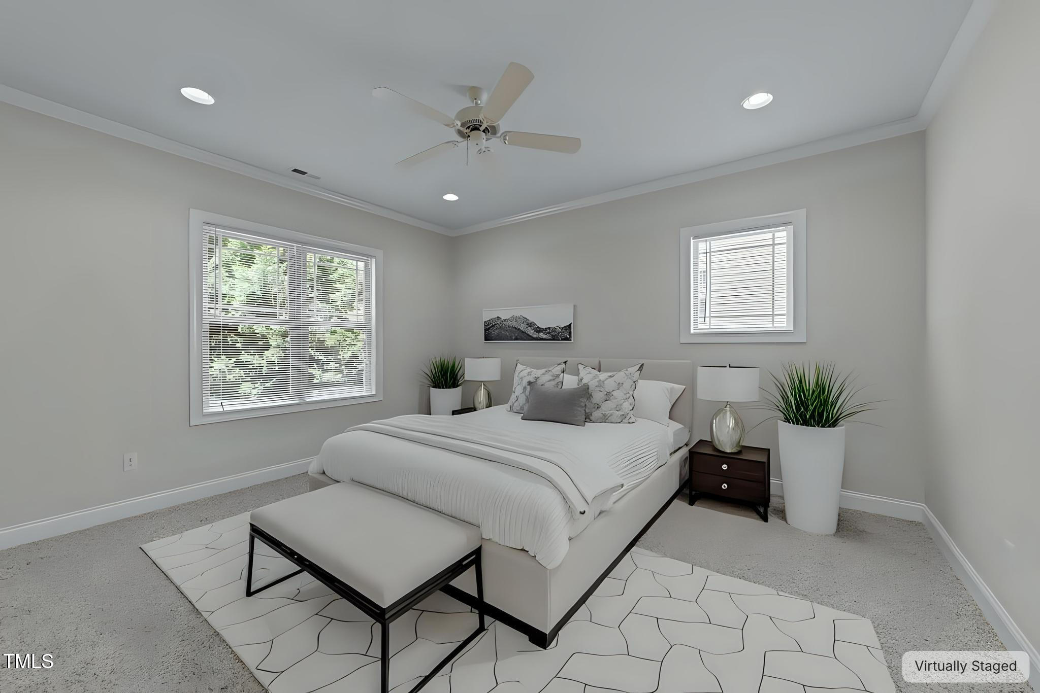 1512 Piazzo Court Apex, NC 27502 - Photo 29 of 59 a bedroom with a large bed and a window