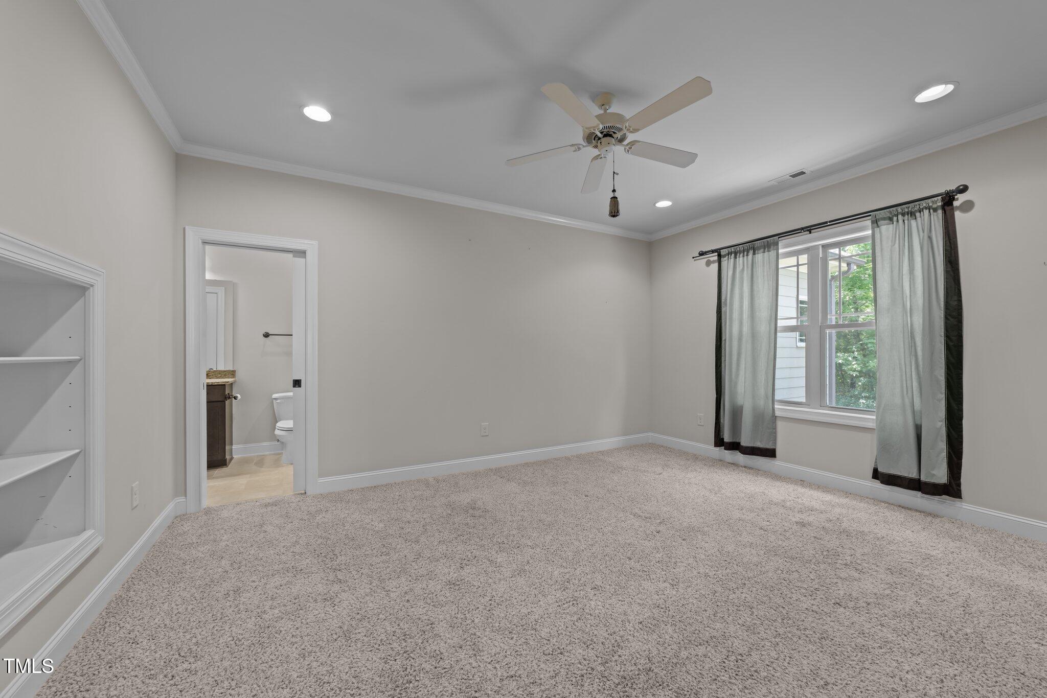 1512 Piazzo Court Apex, NC 27502 - Photo 32 of 59 a view of an empty room with a window