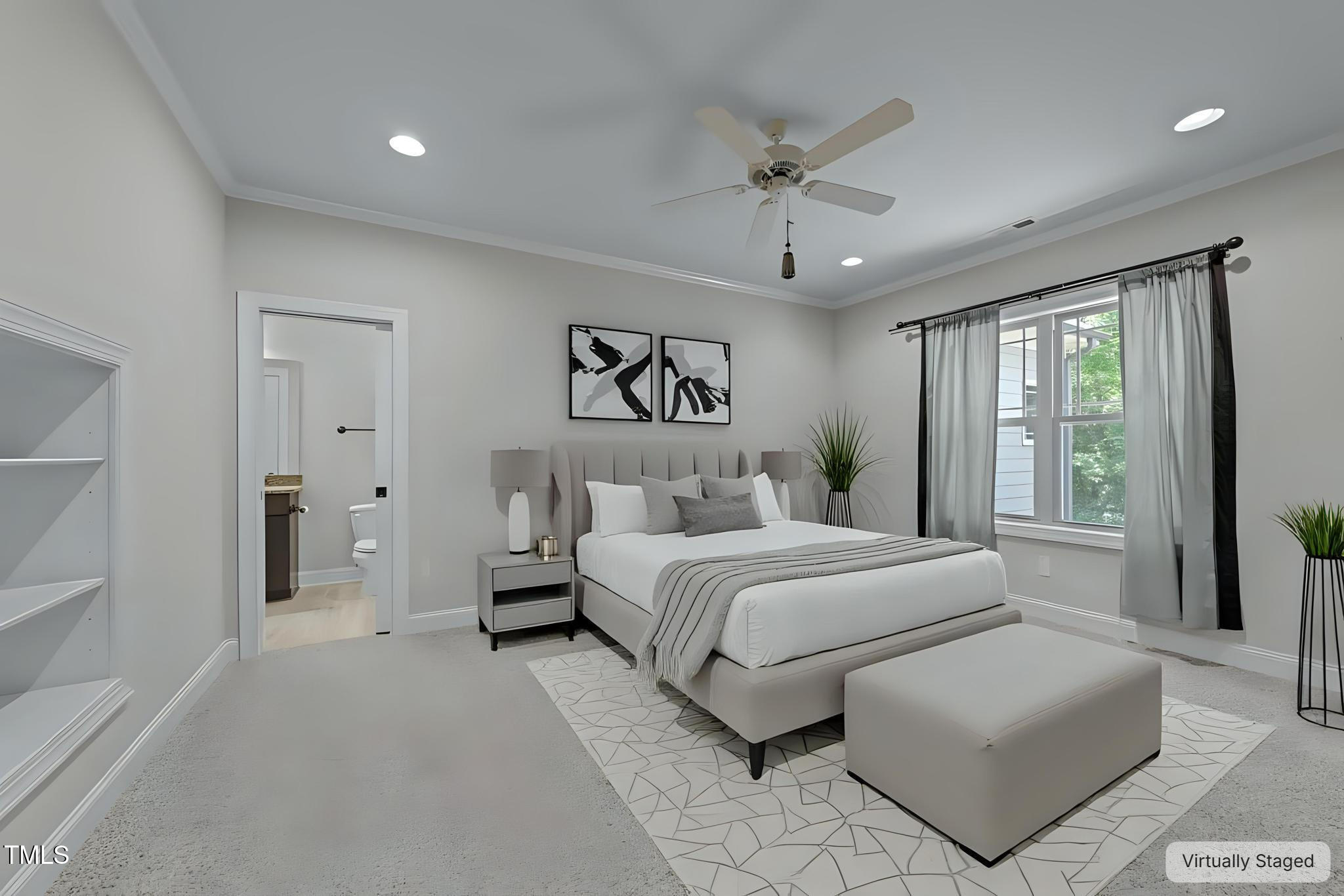 1512 Piazzo Court Apex, NC 27502 - Photo 33 of 59 a spacious bedroom with a bed and glass walk in closet