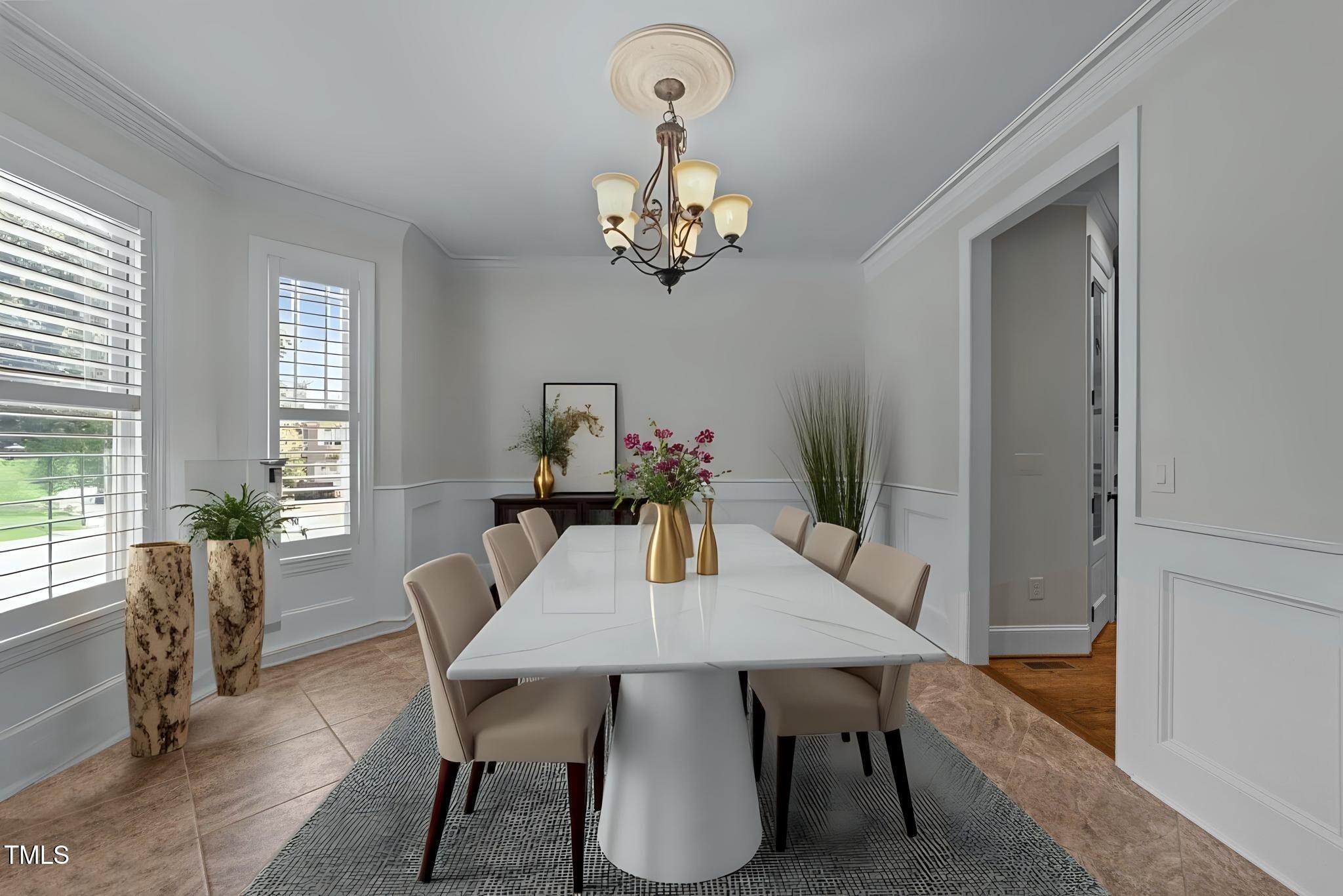 1512 Piazzo Court Apex, NC 27502 - Photo 4 of 59 a view of a dining room with furniture window and wooden floor