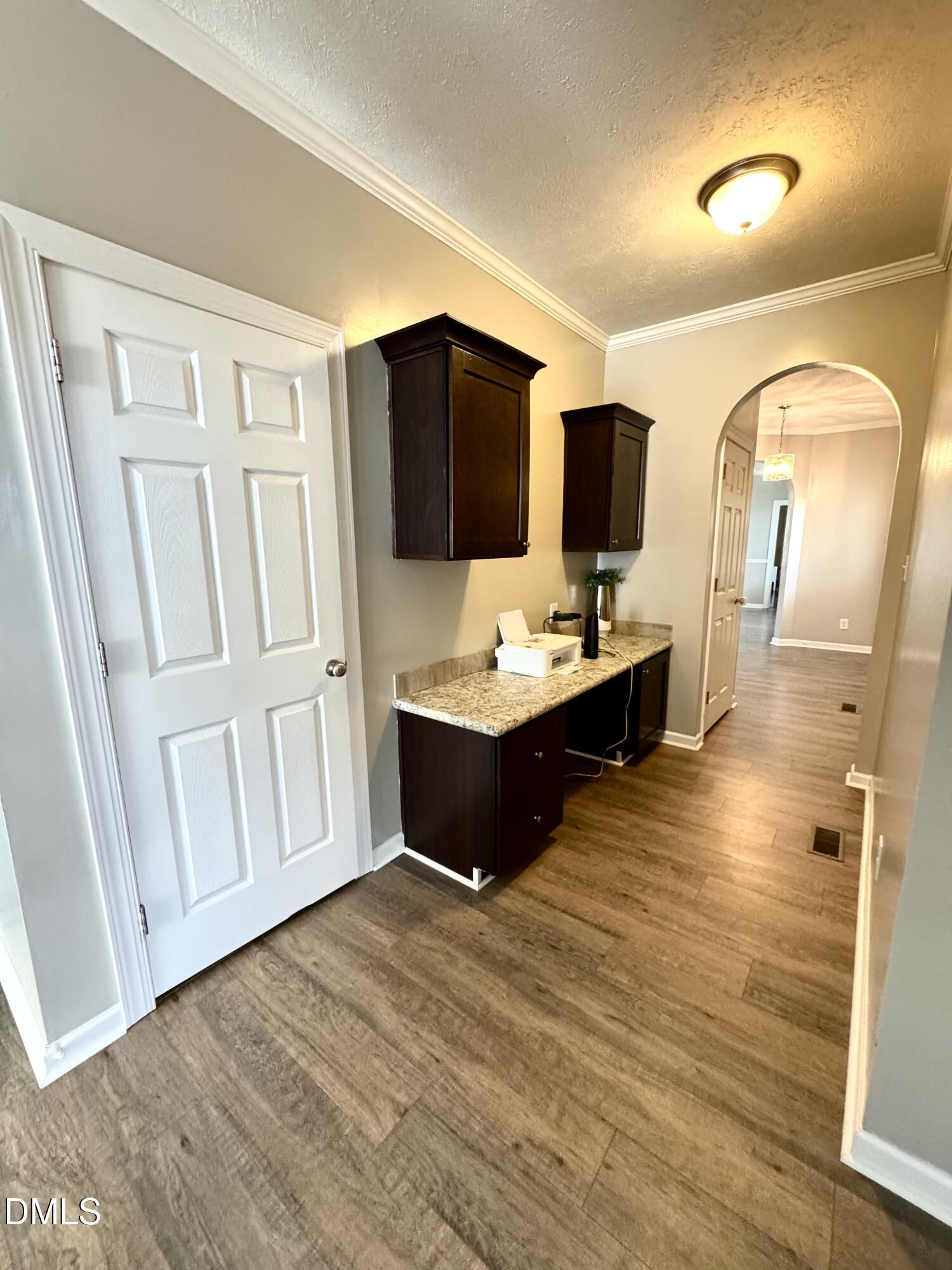 640 Tart Town Road Dunn, NC 28334 - Photo 16 of 71 a room with a wooden floor and furniture