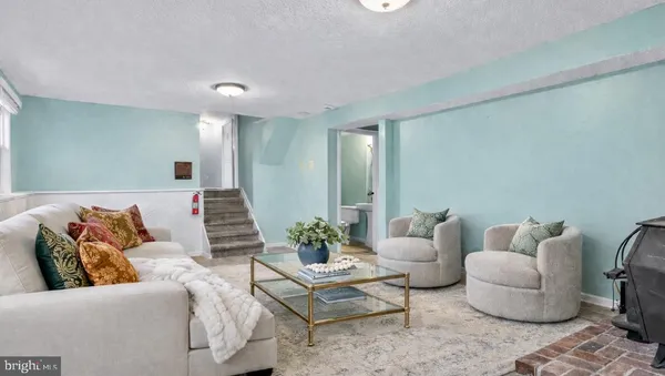 a living room with furniture and a couch