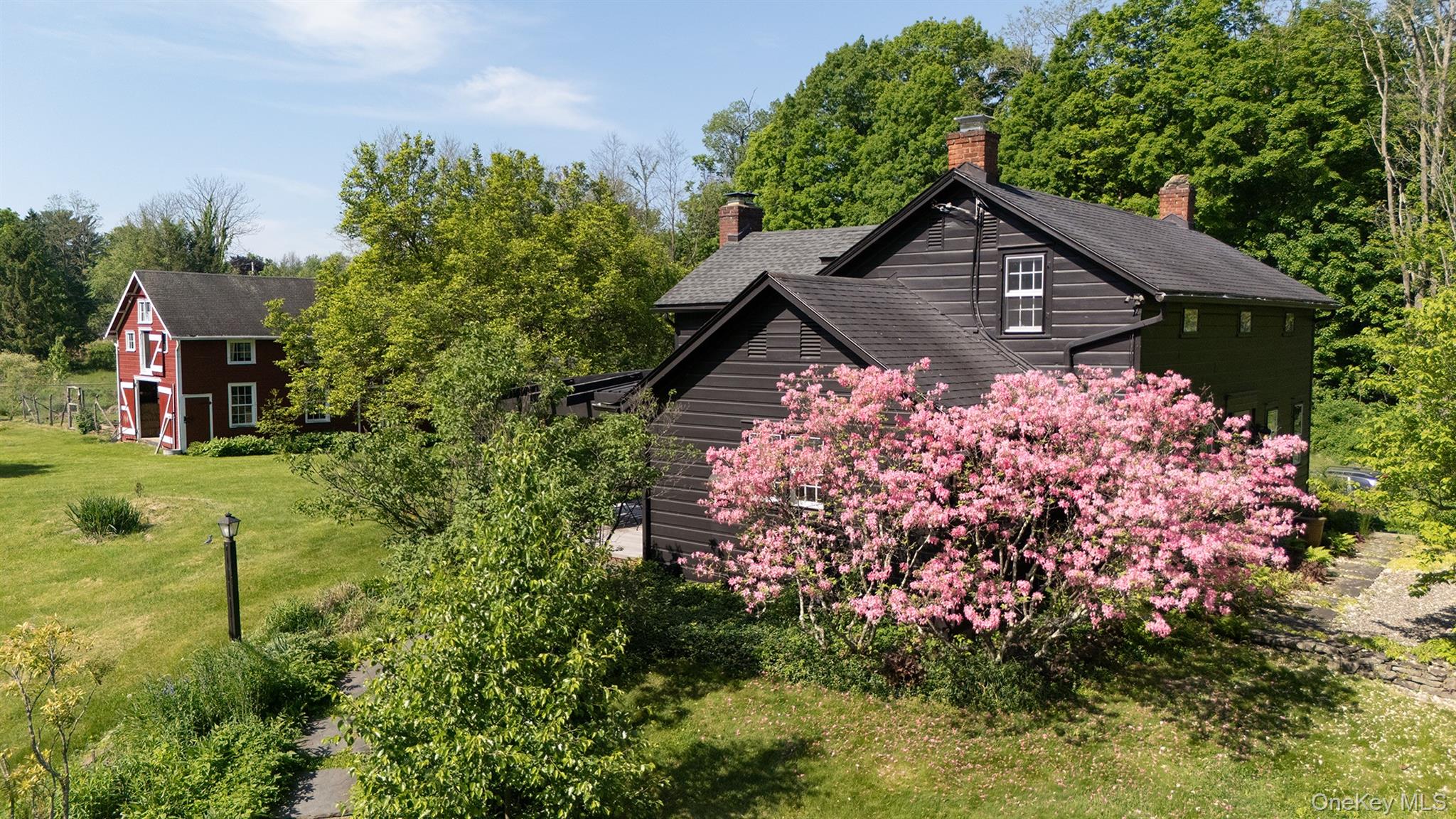 77 Upper Hook Road Rhinebeck, NY 12572 - Photo 2 of 48 a front view of house with garden