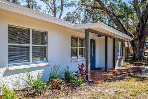 a front view of a house with a porch