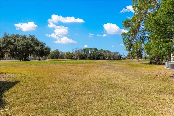 $1,550 | 15203 Sandalwood Drive, Unit 203, Wildwood, FL 34785