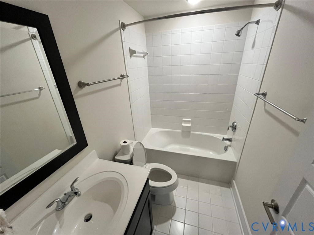 4324 Bon Secours Parkway, Unit A Henrico, VA 23233 - Photo 14 of 19 Bathroom featuring vanity, shower combination, an