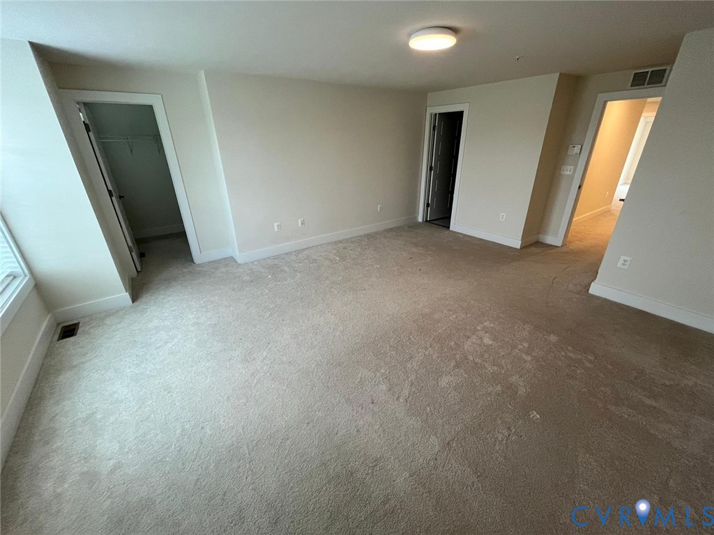 4324 Bon Secours Parkway, Unit A Henrico, VA 23233 - Photo 15 of 19 Carpeted empty room with baseboards