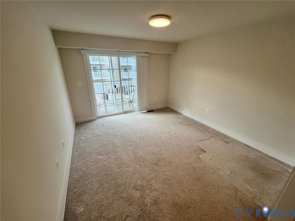 4324 Bon Secours Parkway, Unit A Henrico, VA 23233 - Photo 16 of 19 Spare room with carpet and baseboards