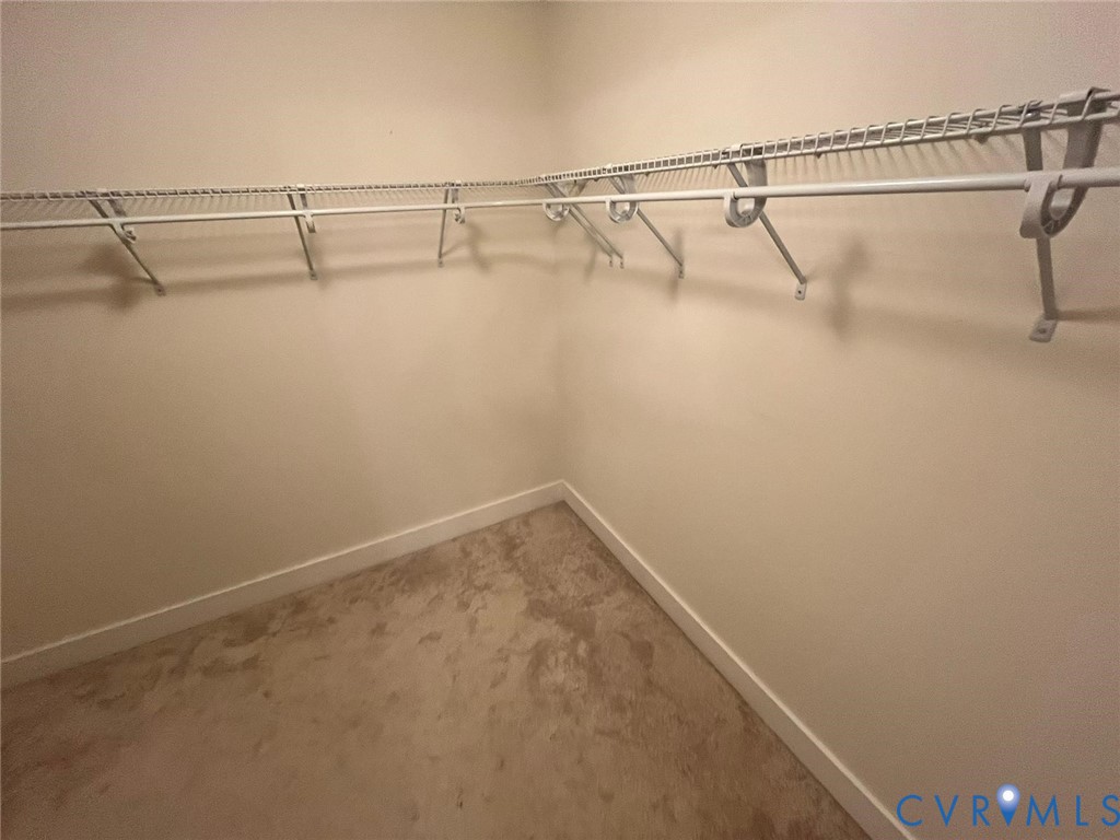 4324 Bon Secours Parkway, Unit A Henrico, VA 23233 - Photo 10 of 19 Walk in closet featuring carpet flooring