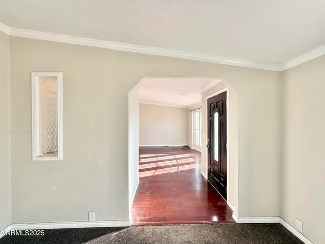 a bathroom with a tub shower sink and cabinets