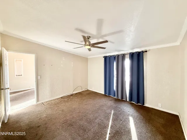 a spacious bathroom with a granite countertop sink and a mirror