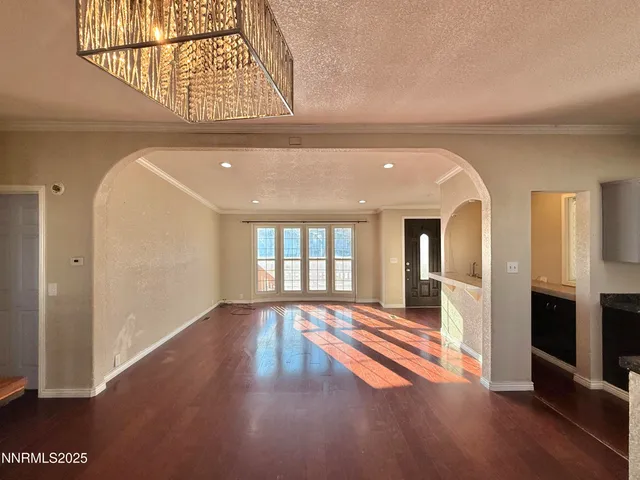 a view of a kitchen with a sink and cabinets
