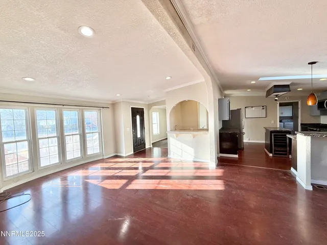 a view of a kitchen with a sink and dishwasher