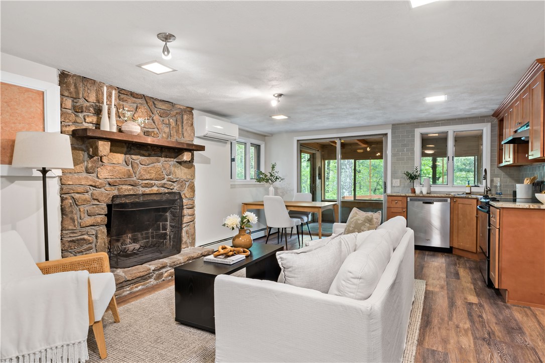 310 Old Coach Road Charlestown, RI 02813 - Photo 24 of 45 A totally separate apartment downstairs is just as beautiful with its open concept living/dining areas and glass sliders to a stunning screened in porch!