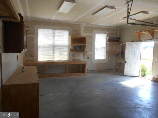 11414 Shane Circle Ridgely, MD 21660 - Photo 3 of 6 Work shop in garage