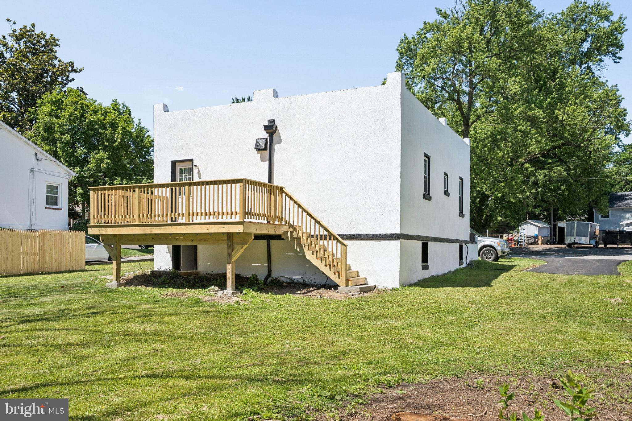 517 Valcour Road Baltimore, MD 21228 - Photo 43 of 47 a house view with a sitting space and garden