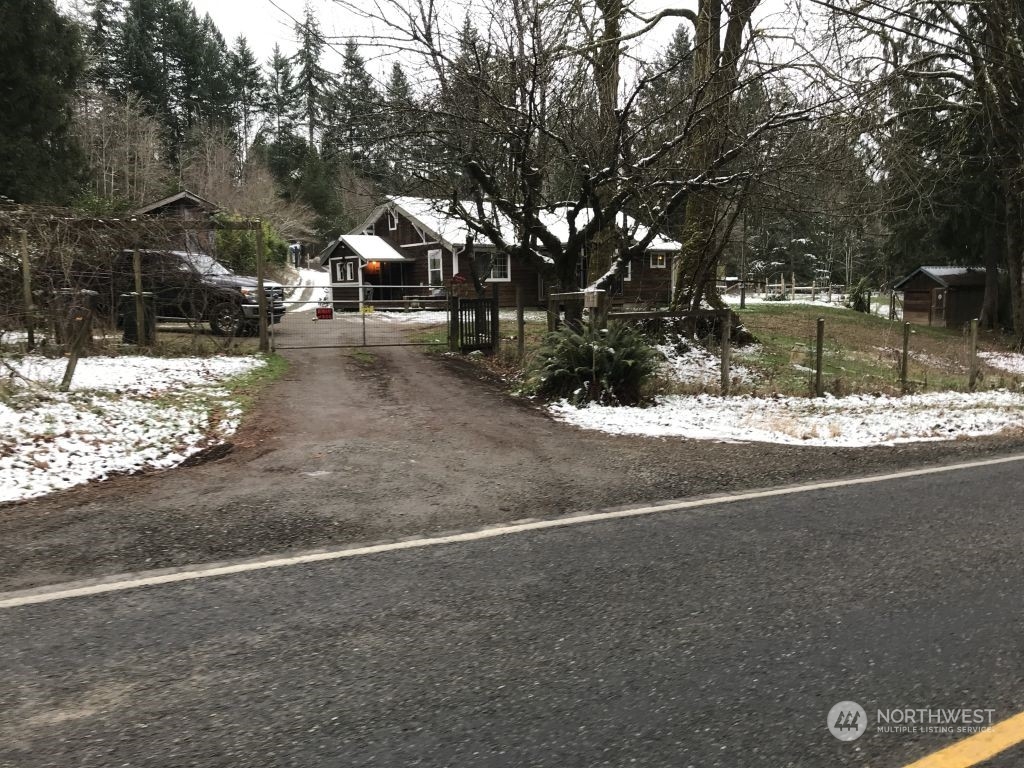 1413 Whiteman Road Southwest Lakebay, WA 98349 - Photo 1 of 1 a view of outdoor space and yard