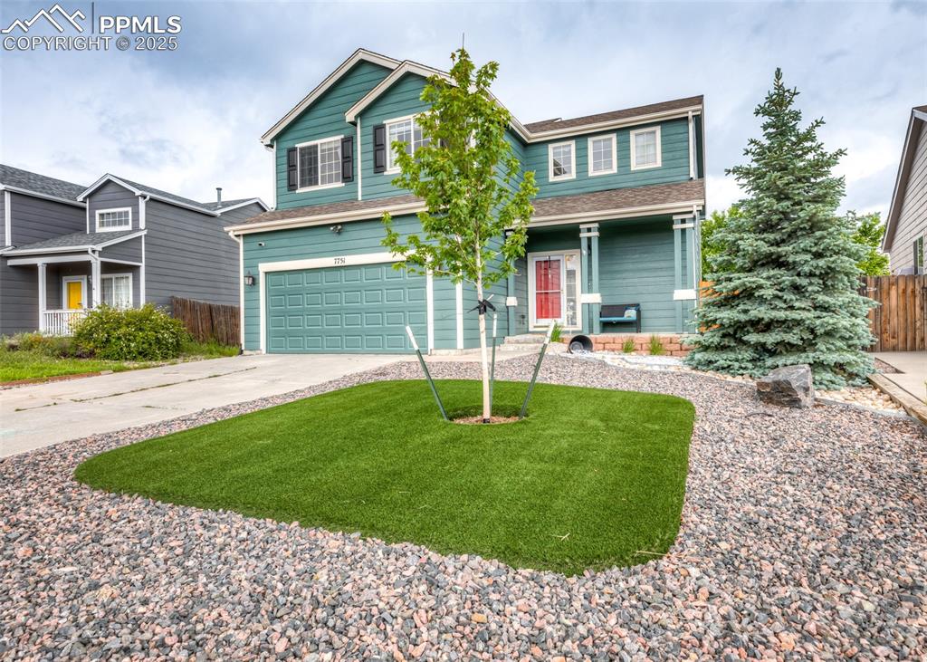 a house view with a garden space