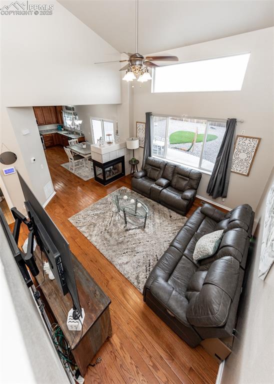 7751 Tompkins Road Peyton, CO 80831 - Photo 5 of 26 a living room with furniture and a flat screen tv