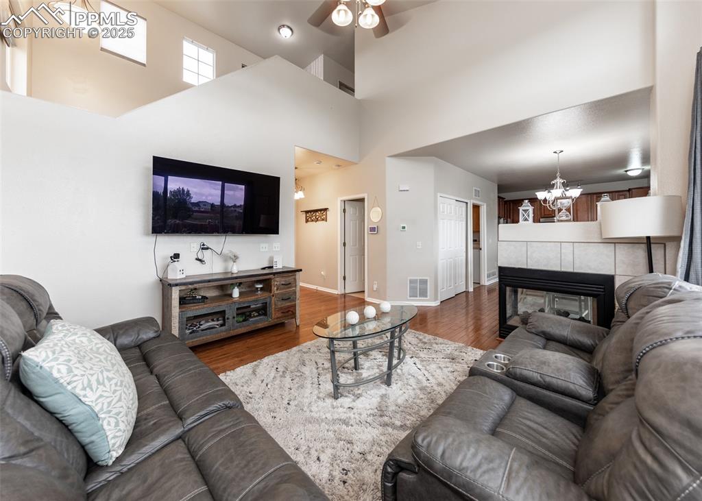 7751 Tompkins Road Peyton, CO 80831 - Photo 6 of 26 a living room with furniture and a flat screen tv