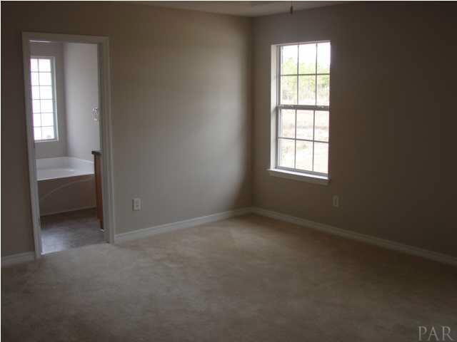 9994 Nichols Lake Road Milton, FL 32583 - Photo 7 of 20 master bedroom