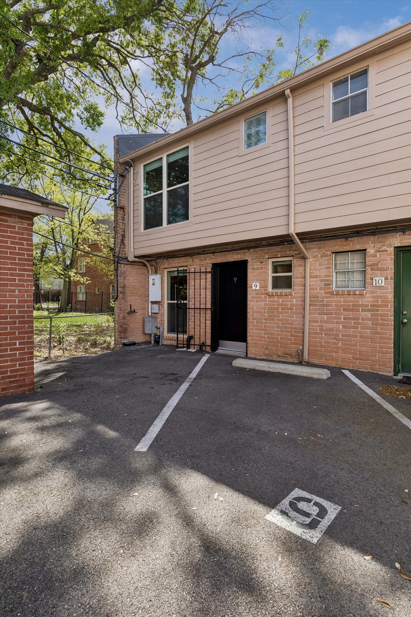 1205 Autrey Street, Unit 9 Houston, TX 77006 - Photo 13 of 32 Back entry with one assigned parking spot.